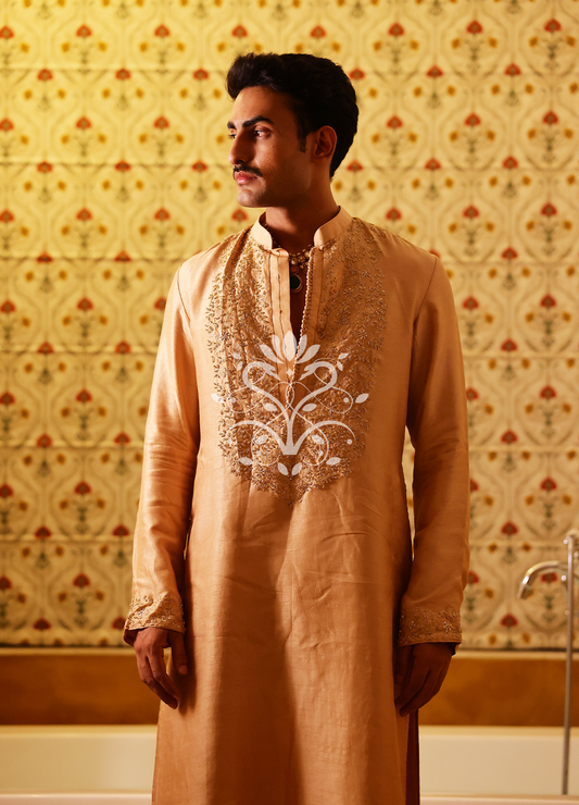 A touch of royalty, woven in threadwork.